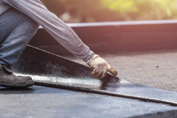 Professional Emergency Waterproofing technician working in Lakewood, NY